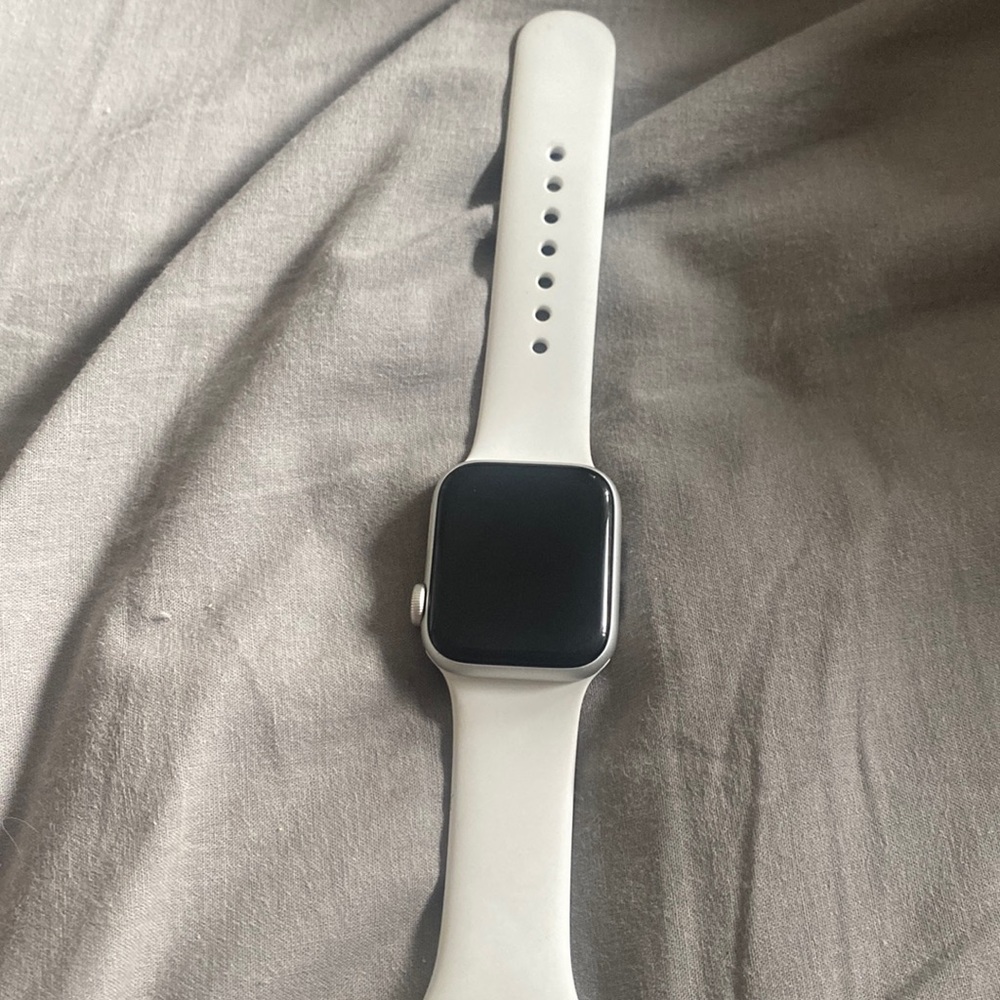 Apple Watch with band and charger